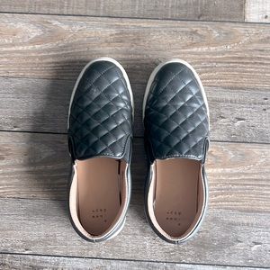 Target slip on pleather shoes. Only worn twice. No scratches. Like new.